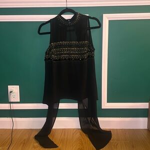 Bebe sleeves blouse with high low hemline.